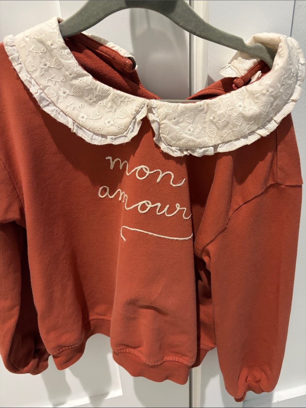 Quincy Mae rust orange sweatshirt with cream lace Peter Pan collar